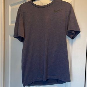 Nike men’s drifit blue/gray short sleeve shirt.